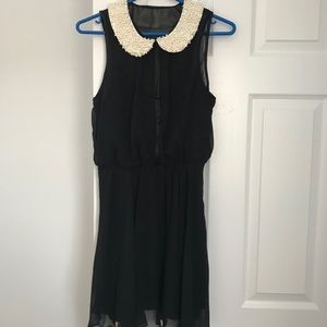Black dress with pearl collar